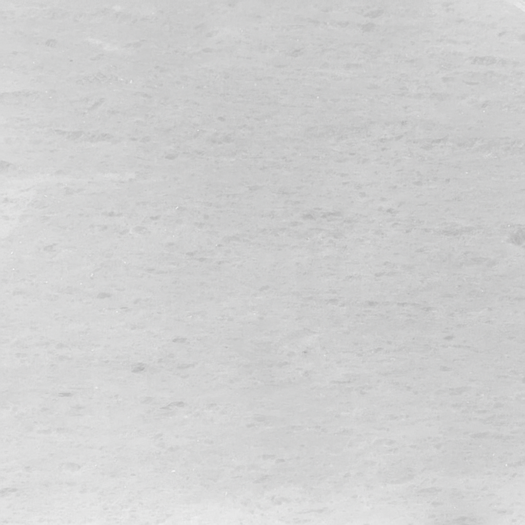 A detailed image of a uniform gray stone texture, perfect as a blank canvas for custom engravings on headstones and memorials. The surface is smooth with subtle tonal variations, suggesting quality material.